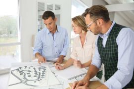 Some people with maps oft a new city.