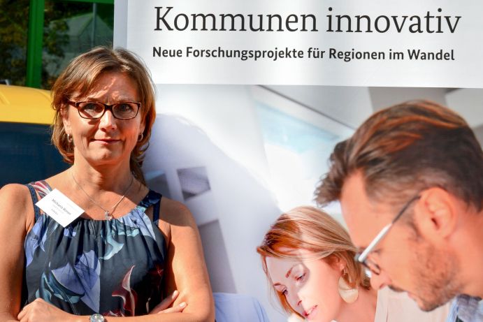 Mrs. Michaela Bonan at the conference "Kommunen Innovativ" in Dortmund.