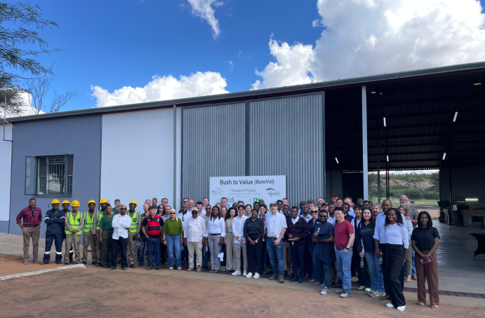 The ButoVal consortium and guests of the inauguration in front of the factory building for the bush biomass utilisation plant.